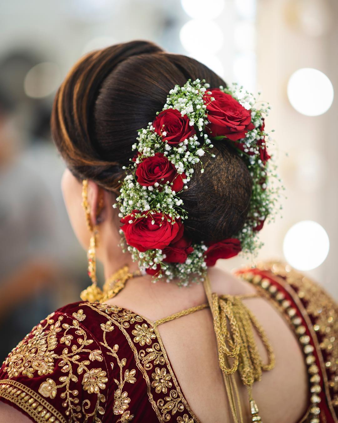 top 15 floral bun hairstyles for brides this wedding season