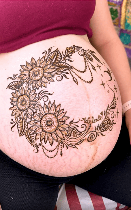 A Color Photo Of Henna Tattoo Paste On A Woman S Hands And Pregnant Belly  Henna