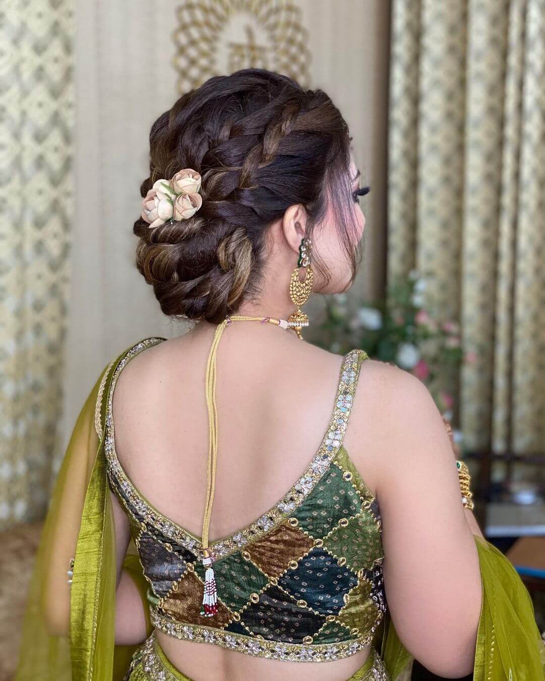 What a beautiful large low bun with real flower gajra Care however should  be taken be  Bridal hair buns Bridal hair decorations Bridal hairstyle  indian wedding