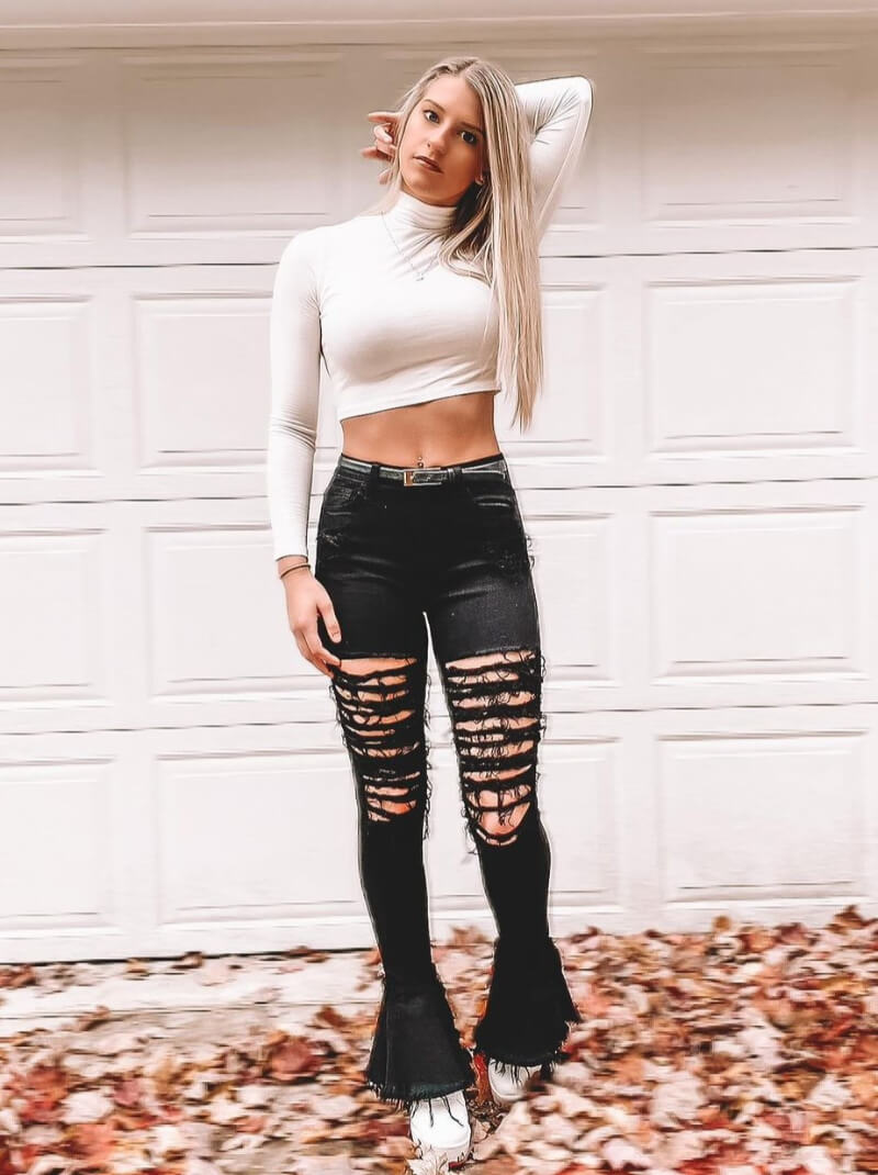 Hannah Clunk In White Crop Top With Ripped Jeans
