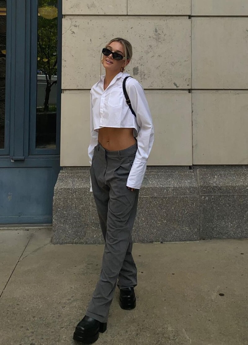 Jessica Stockstill In White Crop Shirt With Grey Pants
