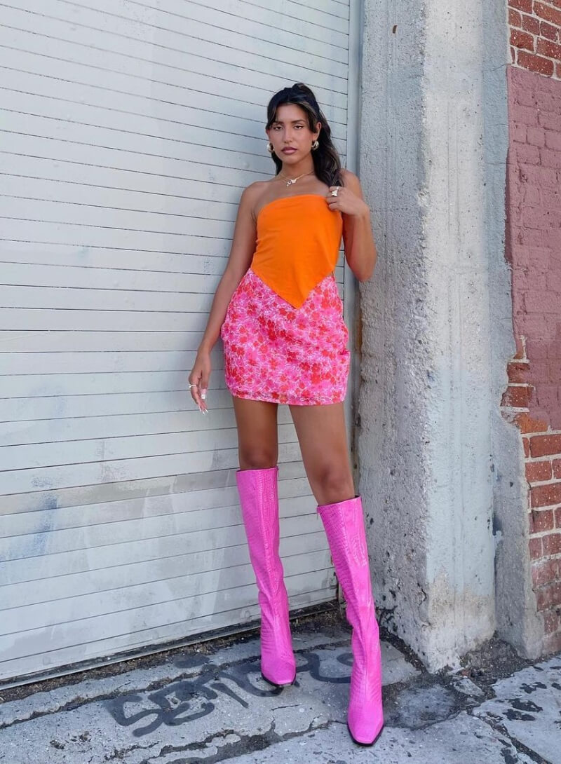 Yolanda Espericueta In Orange Strapless Top With Mini Skirt