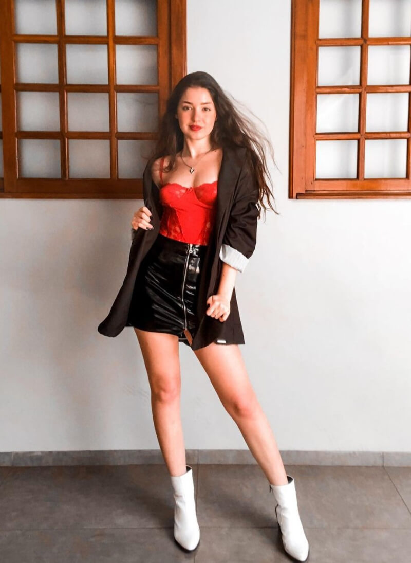 Ana Maria Garcia Wolf  In Red Cami Top With Leather Mini Skirt