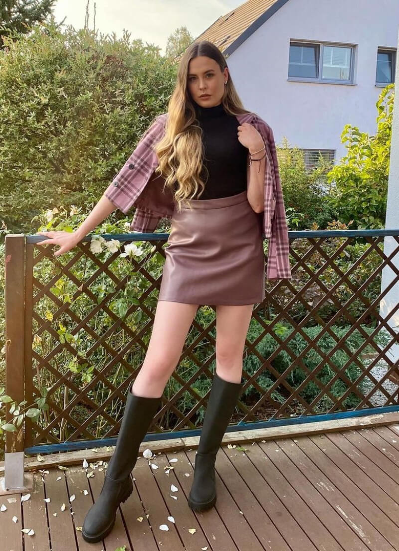 Karina Pochwała In Black Top with Leather Short Skirt