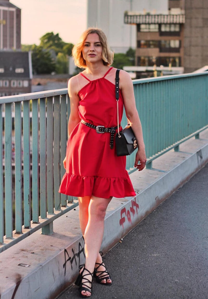 Monika Tworz In Red Ruffle Short Dress