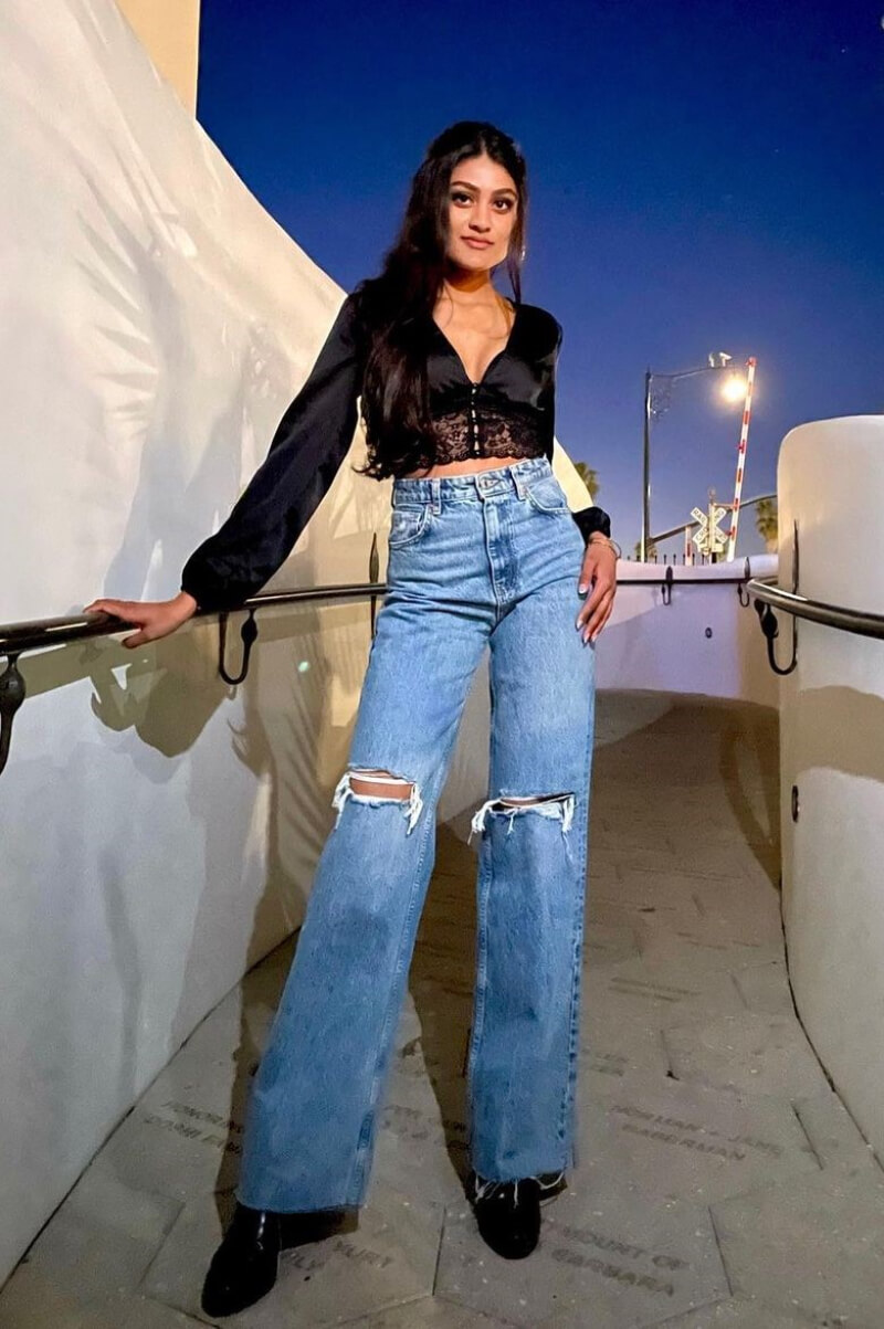 Shikhaa Patell In Black Crop Top With Ripped Denim Bottoms