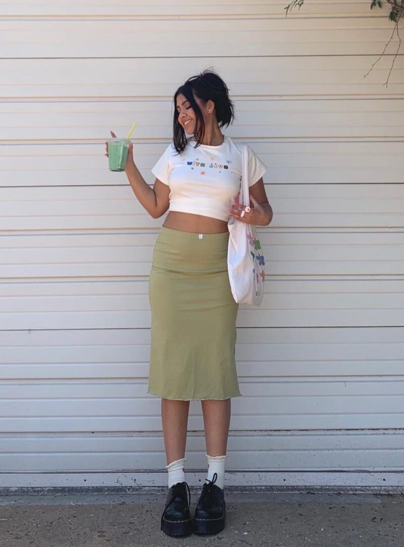 Armin Arshe In a White Crop Top With a Skirt Outfit