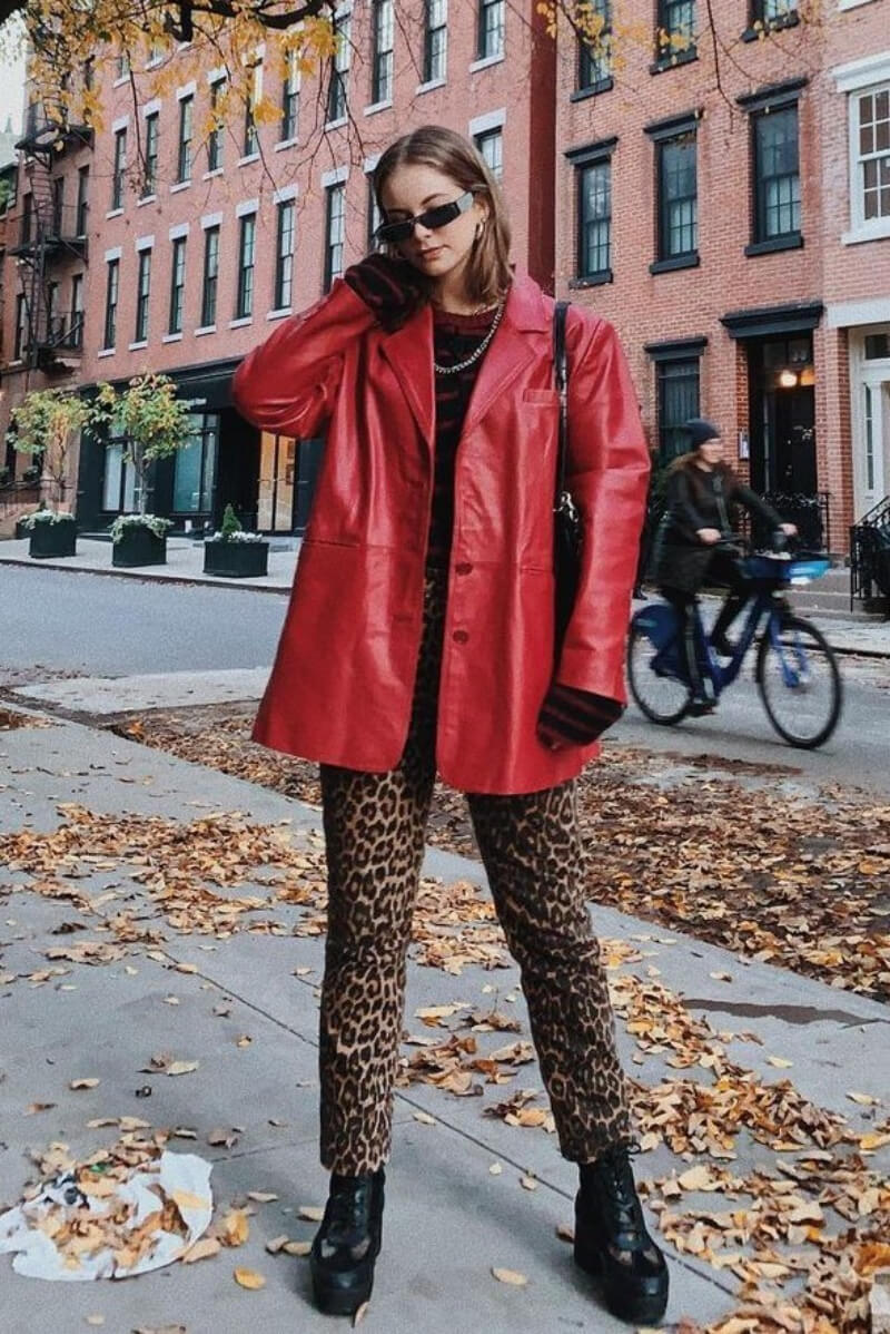 Emiliana Lahrssen In a Red Leather Long Coat With Printed Pants