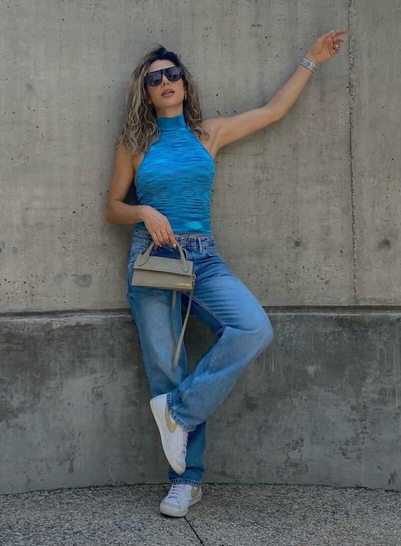 Ilse Jimenez G In Blue High Neck Top With Denim Jeans