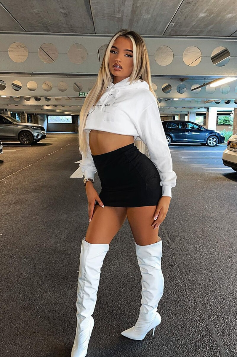Kiersha Mckenna In a White Baggy Crop Top With Mini Skirt