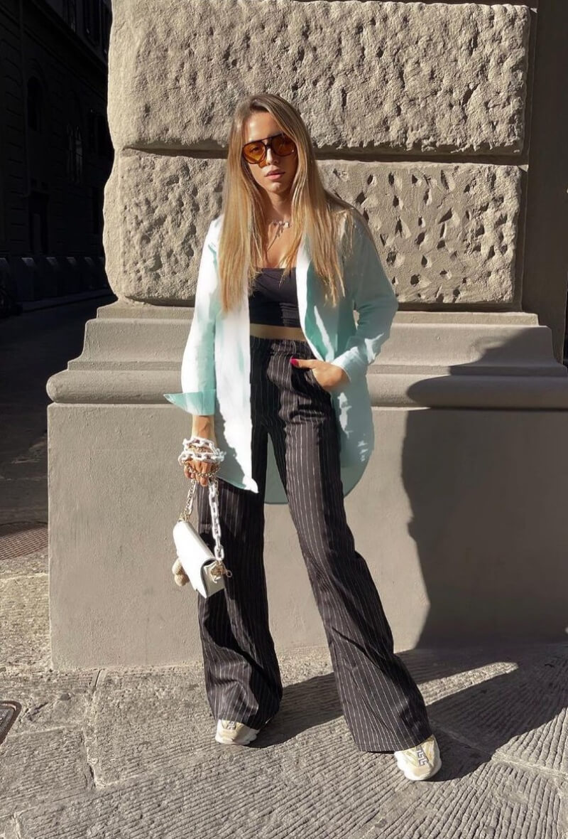 Nadja Stanojevic In Long Shirt With Black Striped Pants