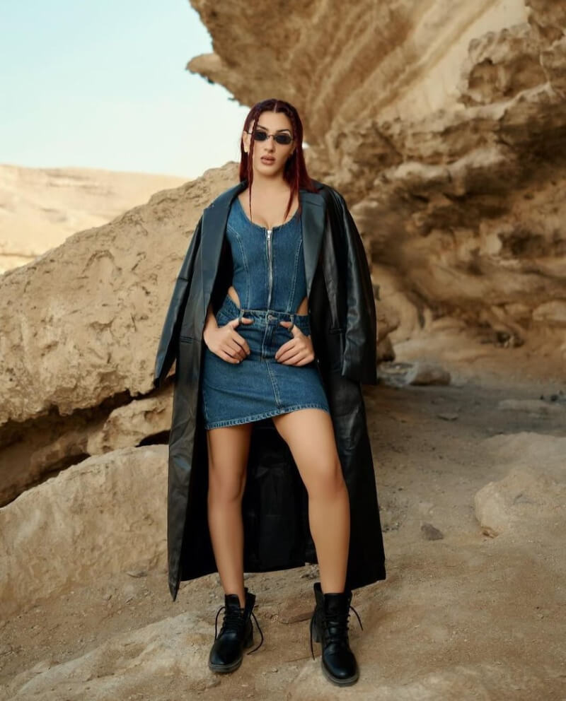Jessie Elserafy In Denim Co-Ord Set With Leather Overcoat